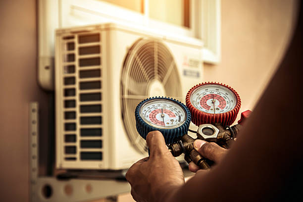 Professional Hvac technician working in De Soto, MO